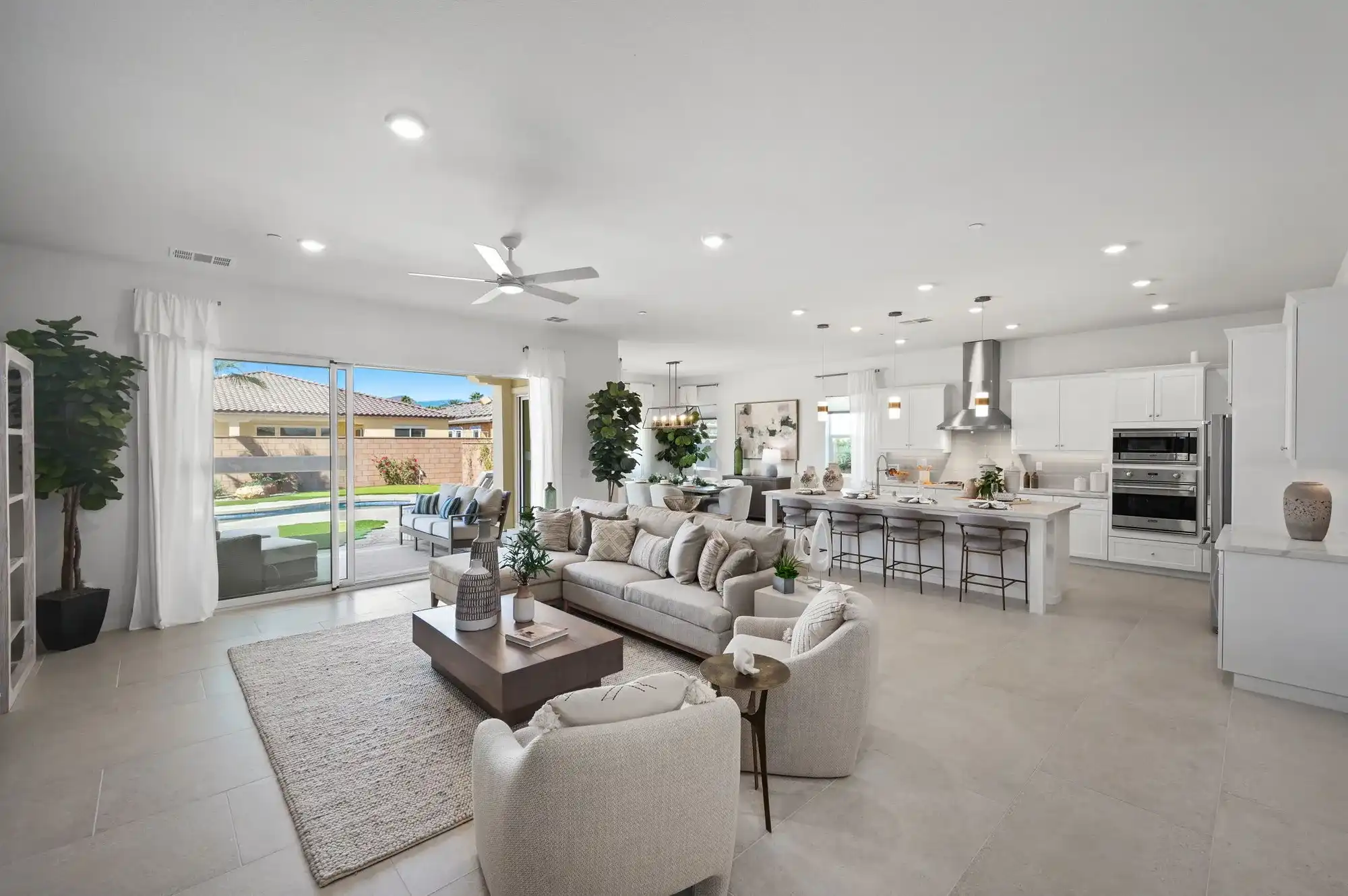 plan-three-the-tiffany_living-room-kitchen-backyard